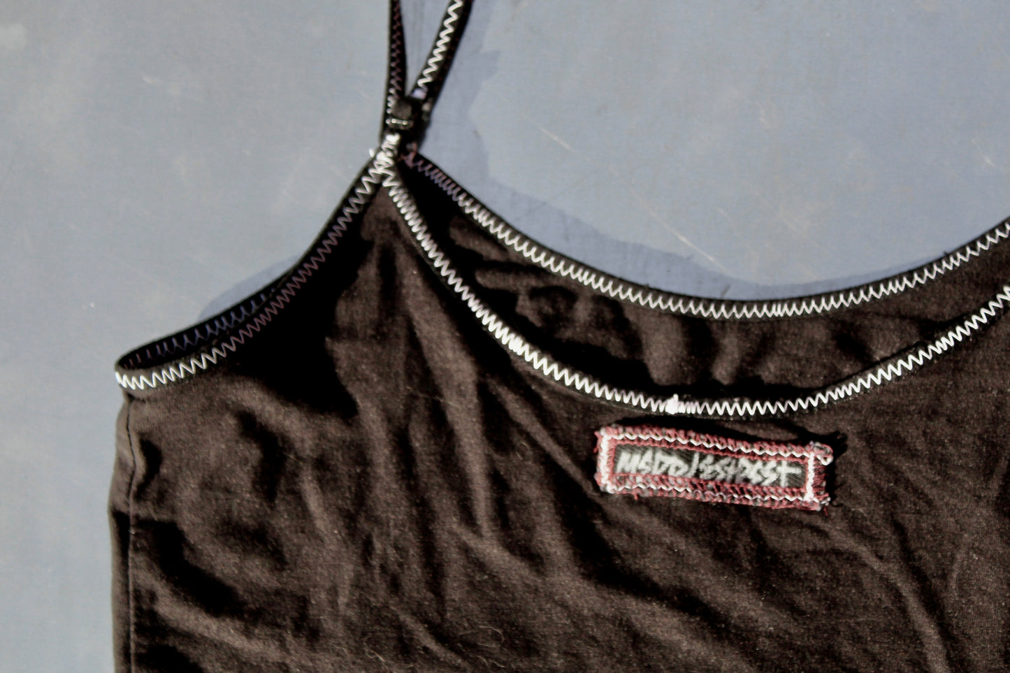 SOLD Plug Tank Top